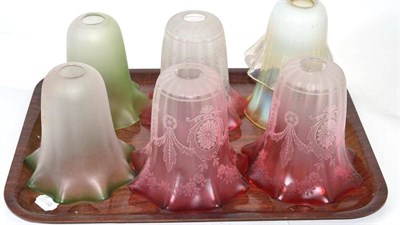 Lot 319 - Two vaseline glass shades; three cranberry and etched glass shades; and two green glass shades (7)