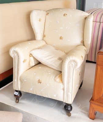Lot 1102 - A Child's Wing Armchair, in floral silk...
