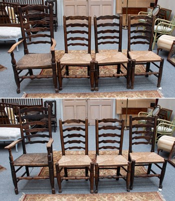 Lot 1199 - A Harlequin Set of Eight Oak Lancashire...