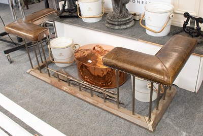 Lot 1113 - A Steel and Brown Leather Club Fender, 170cm...