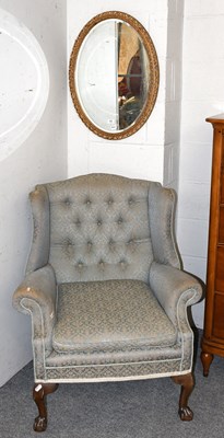 Lot 482 - A 1920s Mahogany Framed Wing Chair, 85cm by...
