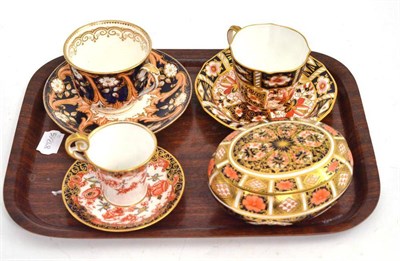 Lot 334 - Royal Crown Derby Imari pattern oval trinket box and cover, tea cup and saucer, coffee cup and...