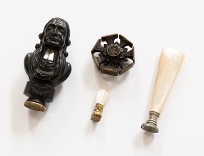 Lot 345 - An Ebonised Figural Desk Seal, the handle...
