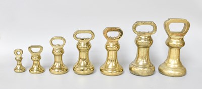 Lot 469 - Twenty Six Various Brass Bell Weights,...