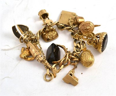 Lot 361 - A 9ct gold charm bracelet with an assortment of charms, with lock and clasp