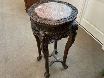 Lot 94 - A Chinese Carved Hardwood and Pink Marble...
