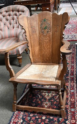 Lot 1326 - A Continental Arts & Crafts Rush Seated Oak...