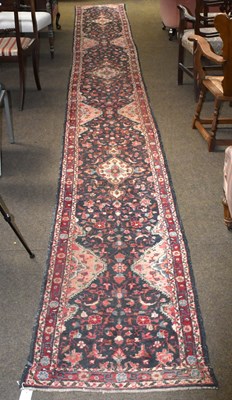 Lot 1240 - Hamadan Runner, the charcoal field of...