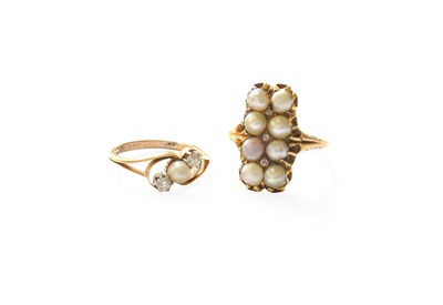 Lot 218 - A Split Pearl and Diamond Three Stone Twist...
