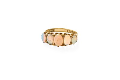 Lot 229 - An 18 Carat Gold Opal Five Stone Ring, the...