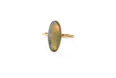 Lot 221 - An Opal Ring, the oval cabochon opal in a...