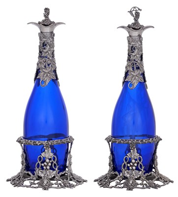Lot 155 - A Pair of Silver Plate Decanter-Stands and a Pair of Silver Plate-Mounted Blue Glass Decanters