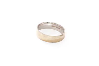 Lot 258 - An 18 Carat White Gold Band Ring, finger size...