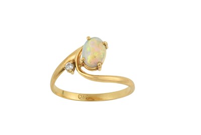 Lot 2374 - An Opal and Diamond Ring an oval cabochon opal...