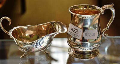 Lot 422 - A silver baluster mug, London 1958; and a silver sauceboat, Birmingham 1912 (2)