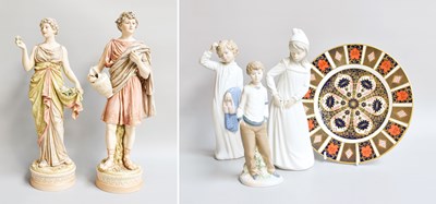 Lot 104 - Two Royal Dux Figures, numbered 211 and 212,...