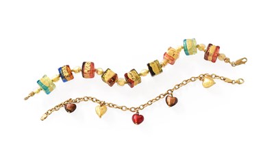 Lot 248 - A Curb Link Bracelet, suspending five heart...
