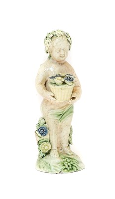 Lot 20 - A Whieldon Type Creamware Figure of a Flower...