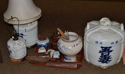 Lot 426 - A Japanese table lamp, height 28cm; a smaller example; a Japanese glazed barrel; and a tray...