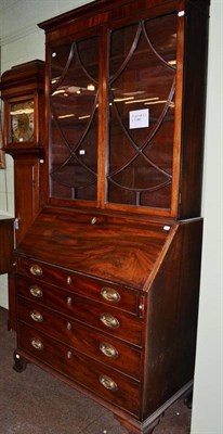 Lot 430 - A Georgian mahogany glazed bureau bookcase