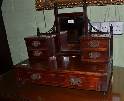 Lot 433 - A reproduction serpentine fronted sideboard