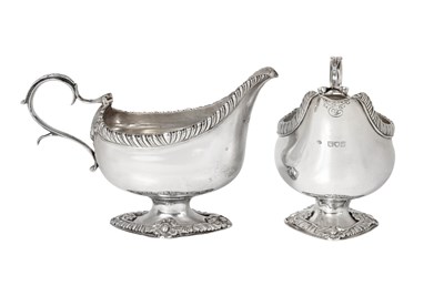 Lot 2195 - A Pair of Edward VII Silver Sauceboats