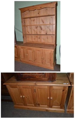 Lot 440 - A modern pine dresser and matching low cupboard