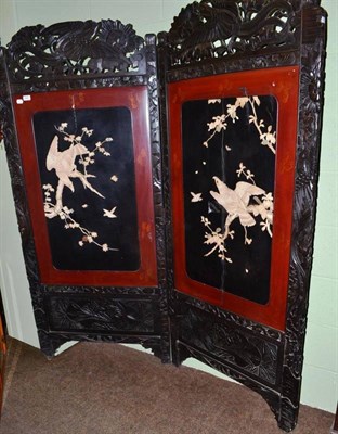 Lot 445 - A Japanese lacquer twin panel screen