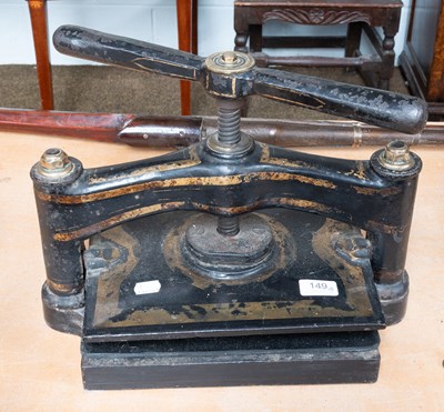 Lot 149 - A Victorian Japanned and Parcel Gilt Cast Iron...