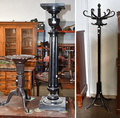 Lot 1305 - A 20th Century Ebonised Torchere, the square...