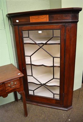 Lot 451 - A mahogany hanging corner cupboard