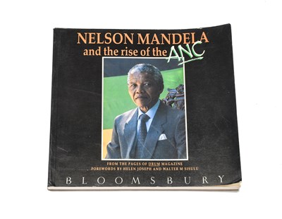 Lot 97 - Signed by Nelson Mandela. Schadeberg (Jurgen),...