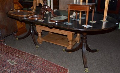 Lot 457 - A mahogany twin pedestal dining table