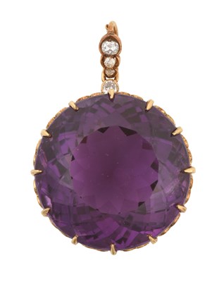 Lot 2460 - An Amethyst and Diamond Pendant the round cut...