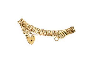 Lot 391 - A 9 Carat Gold Gate Link Bracelet, with a 9...