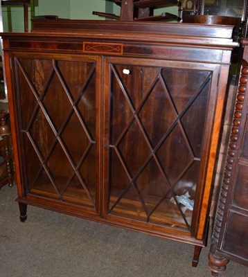 Lot 461 - An Edwardian inlaid mahogany display cabinet