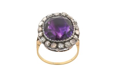 Lot 2383 - An Amethyst and Diamond Cluster Ring the...