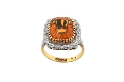 Lot 2381 - A Citrine and Diamond Cluster Ring the cushion...