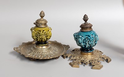 Lot 201 - Linthorpe Pottery Inkwells, with brass mounts (2)