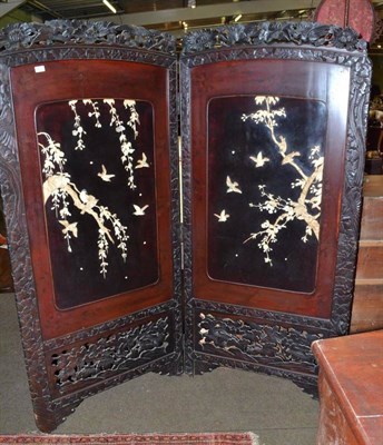 Lot 463 - A Japanese lacquer twin panel screen