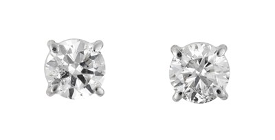 Lot 2239 - A Pair of Diamond Solitaire Earrings the round...