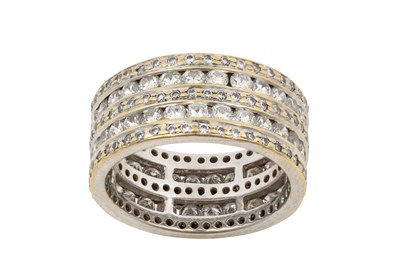 Lot 2254 - A Diamond Eternity Ring three rows of round...