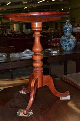 Lot 465 - A modern red stained tripod table