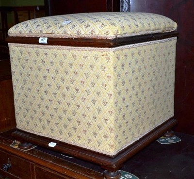 Lot 467 - A Victorian mahogany framed ottoman stool upholstered in yellow diapered weave