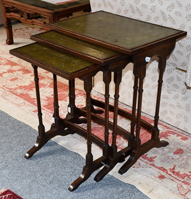 Lot 1396 - A Nest of Three Mahogany Occasional Tables...