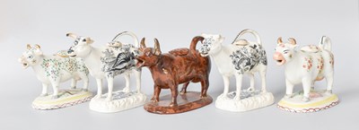 Lot 192 - Five Staffordshire Pottery Cow Creamers, 19th...