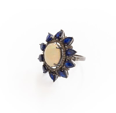 Lot 389 - An Opal, Sapphire and Diamond Cluster Ring,...