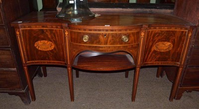 Lot 490 - A mahogany Sheraton style serpentine fronted sideboard