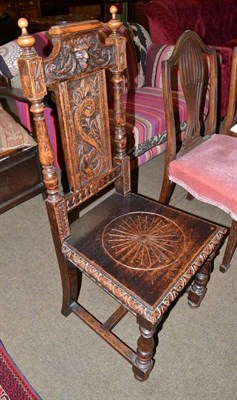 Lot 496 - A Victorian carved oak side chair