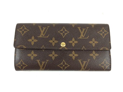 Lot 1048 - Louis Vuitton Sarah Logo Leather Wallet, with...